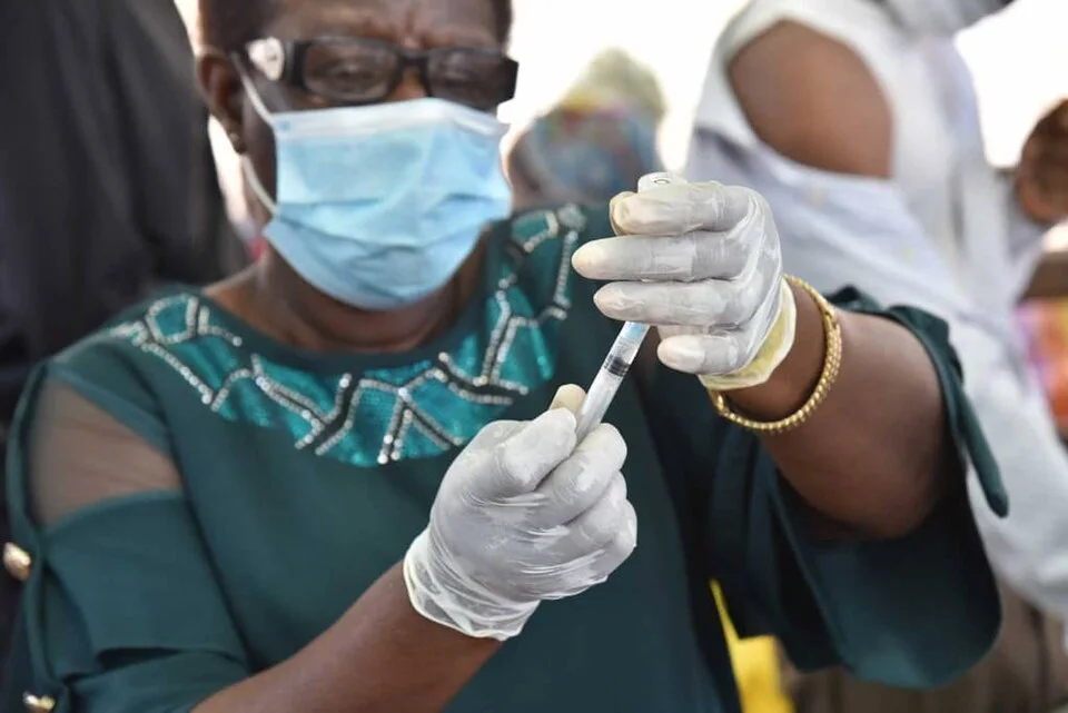 Yellow fever vaccination, identified by the file title; a comparative public-health example from Africa.