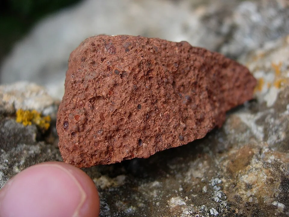 Bauxite identified in the metadata as from Hérault, France; a comparative example, not Indian geological evidence.