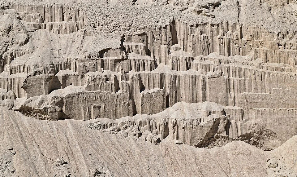 Bank erosion structures in sand at Harris River; a comparative illustration of river erosion.