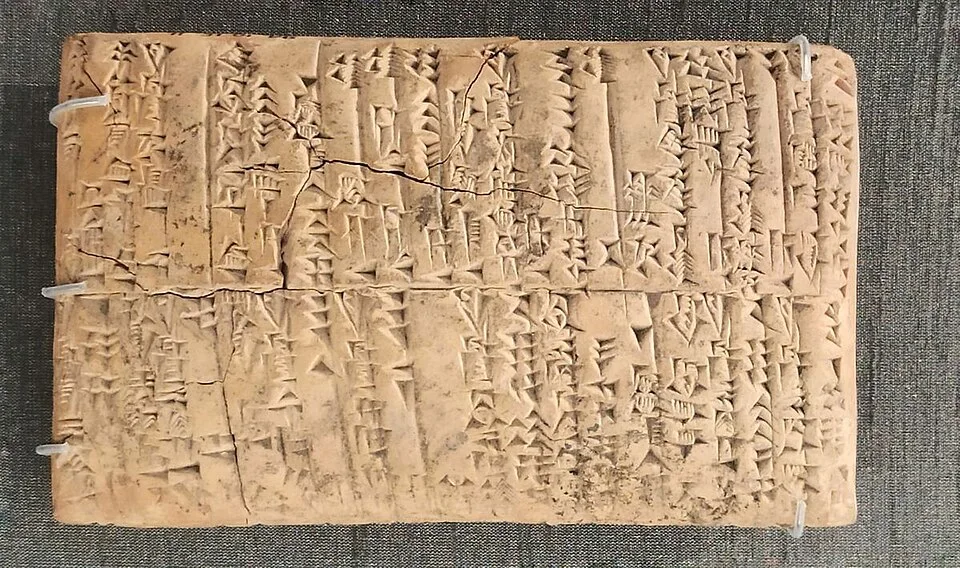 Mesopotamian tablet described as recording barley deposited at a “village of Meluhha”; external evidence relevant to Harappan contacts.