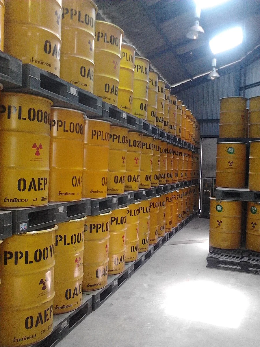 Radioactive-waste barrels, as identified in the supplied metadata; illustrative of waste containment.