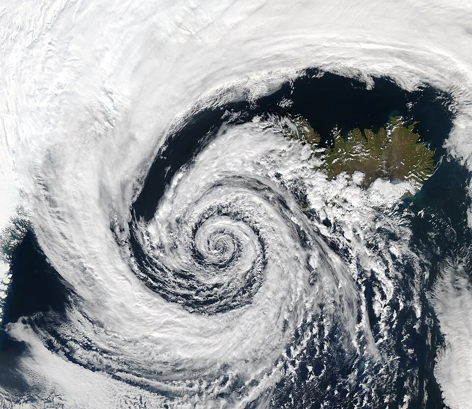 Low-pressure system near Iceland, recorded by Aqua MODIS; a Northern Hemisphere example of cyclonic circulation.